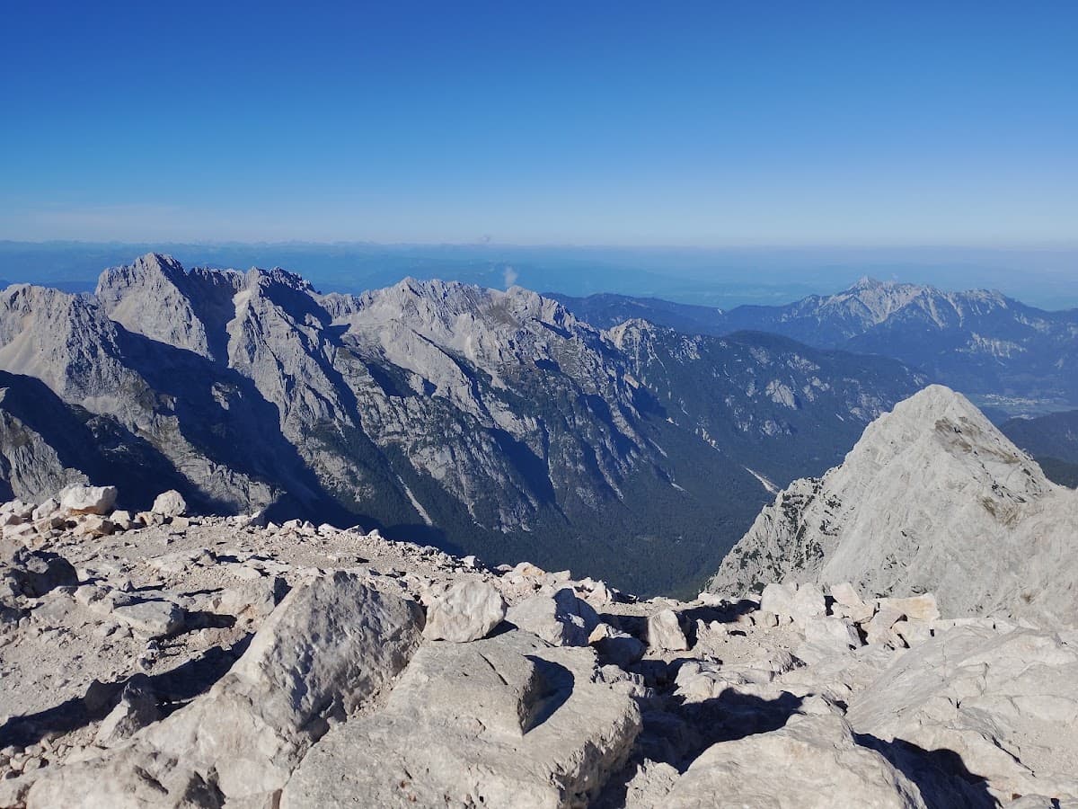 Rocky alpine mountain peaks under clear blue sky