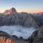 Zicht op de noordzijde van de Triglav van boven Kriški Podi